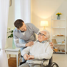 Male nurse providing help to elderly man