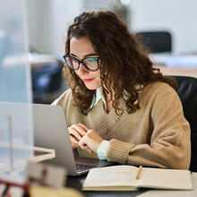 Woman researcher with a laptop
