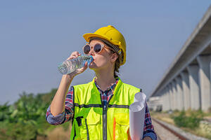 Worker drinking water
