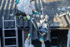 Workers removing asbestos