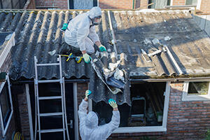 Workers removing asbestos