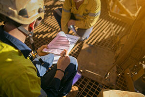 Worker wearing safety helmet
