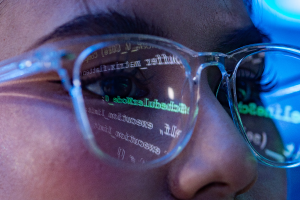 Woman glasses code reflection technology face eye screen
