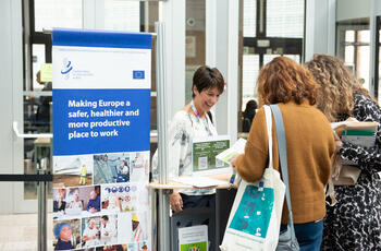Info stand of the Healthy Workplaces campaign at the European Council headquarters in Brussels.