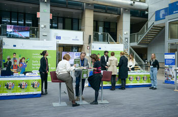 Info stand of the Healthy Workplaces campaign at the European Council headquarters in Brussels.
