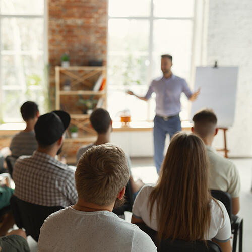 Male speaker giving a presentation