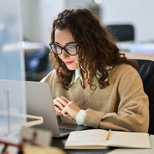 Woman researcher with a laptop