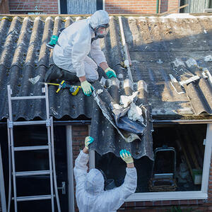 Workers removing asbestos