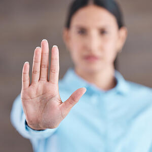 Woman with no gesture for sexual harassment and violence in workplace