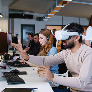 Man in VR glasses at work