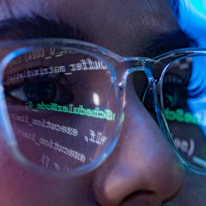 Woman glasses code reflection technology face eye screen