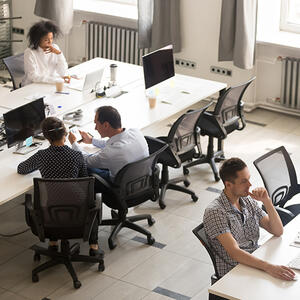 Staff office workers working in modern corporate space